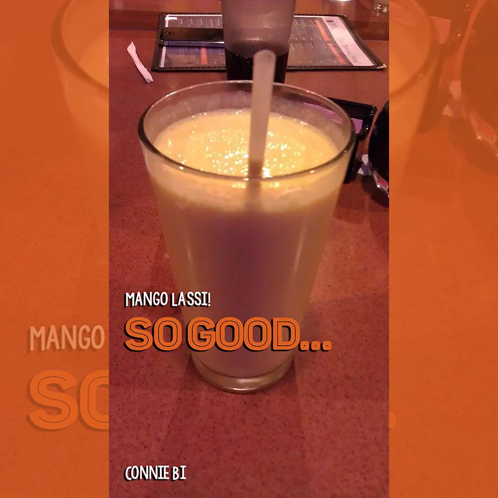 A bright and colorful advertisement for the "Curry Corner" restaurant, showcasing its flavorful dishes.